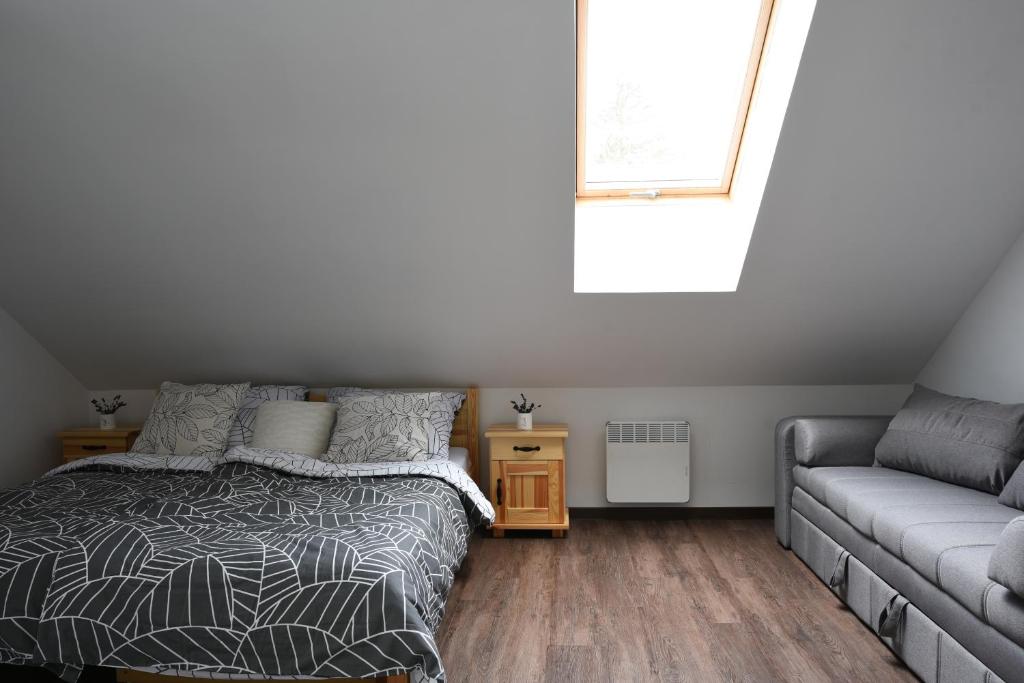 Postel nebo postele na pokoji v ubytování Apartmány Vízmberk