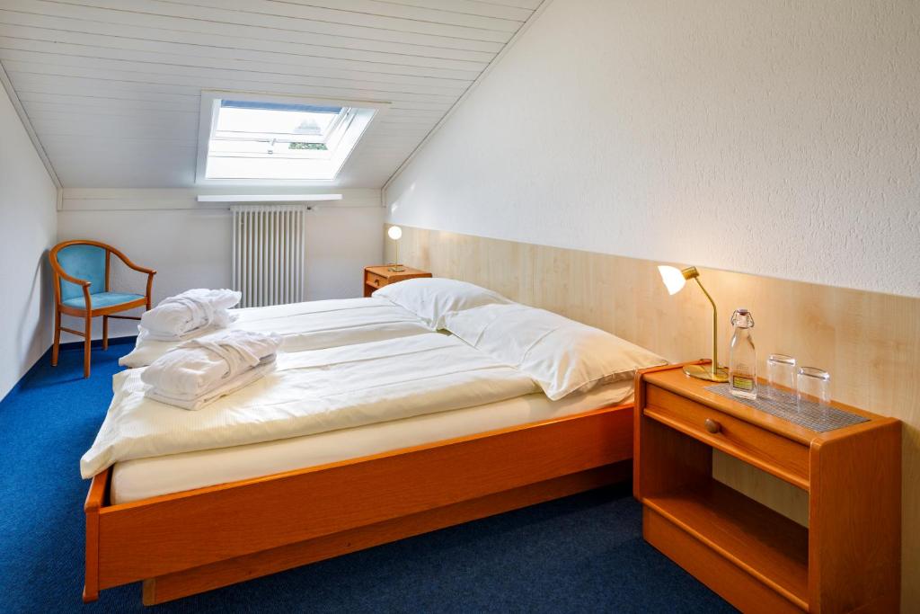 Postel nebo postele na pokoji v ubytování Central Hotel Post