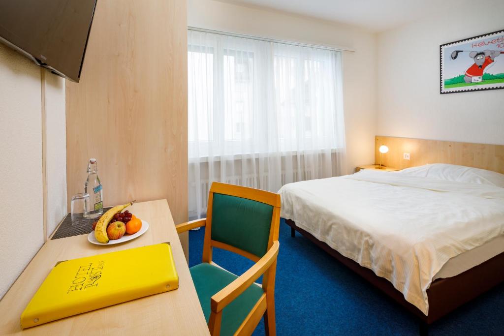 Postel nebo postele na pokoji v ubytování Central Hotel Post
