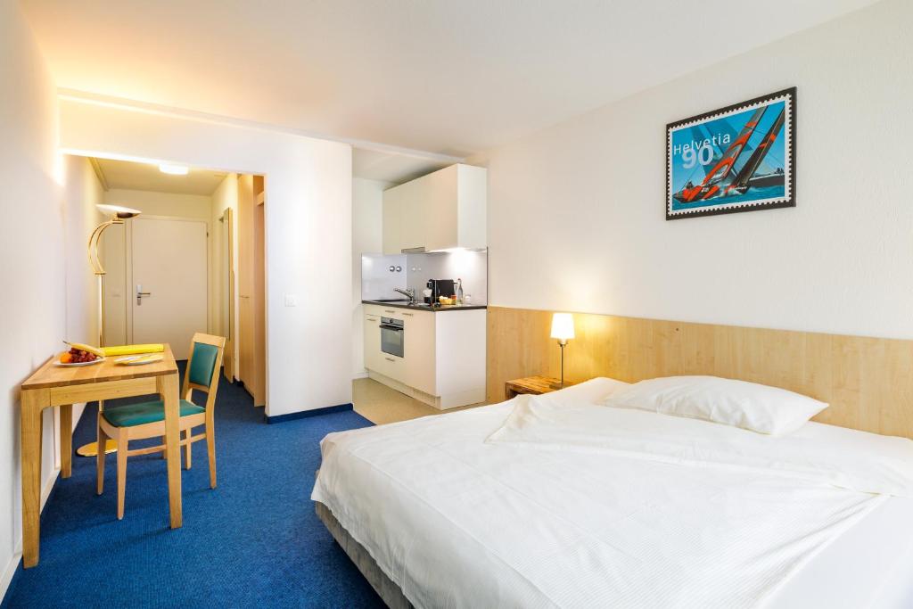 Kuchyň nebo kuchyňský kout v ubytování Central Hotel Post