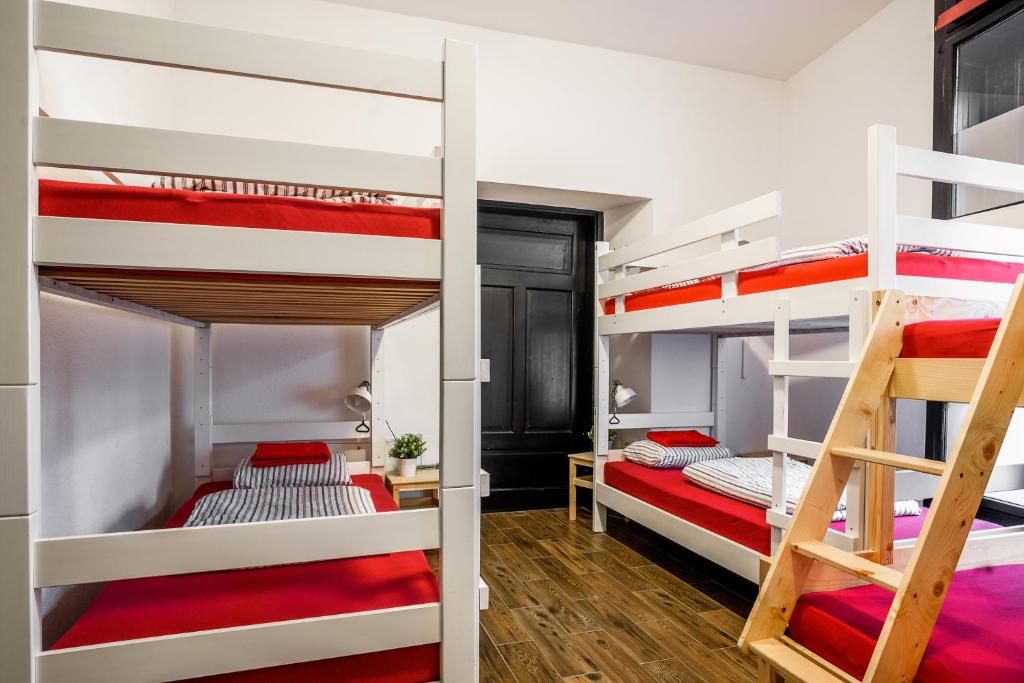 Postel nebo postele na pokoji v ubytování Turn Hostel