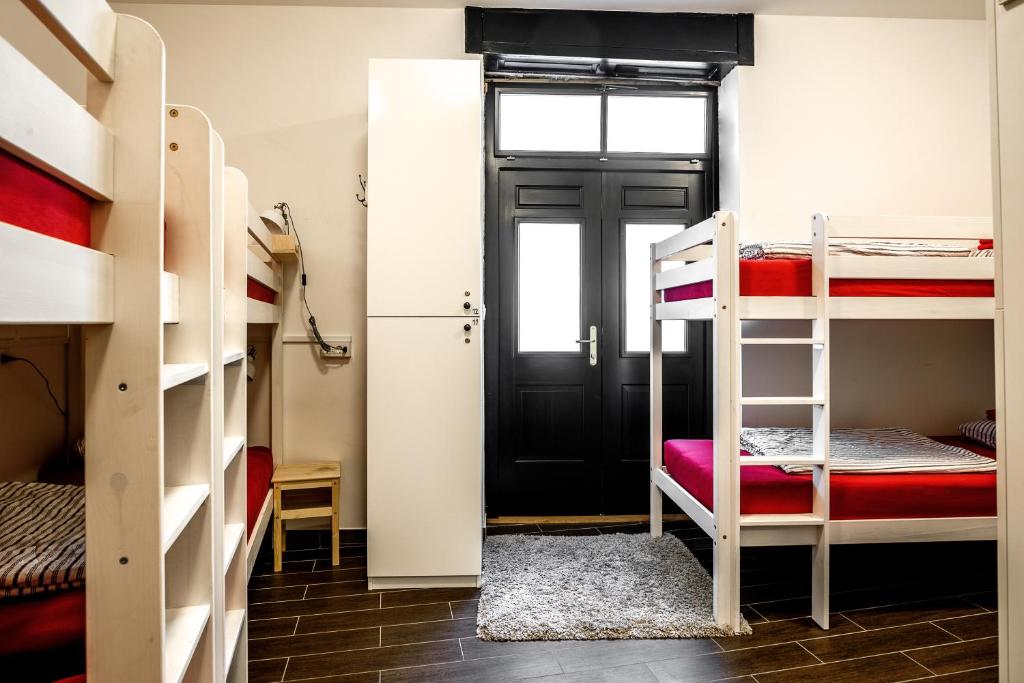 Postel nebo postele na pokoji v ubytování Turn Hostel