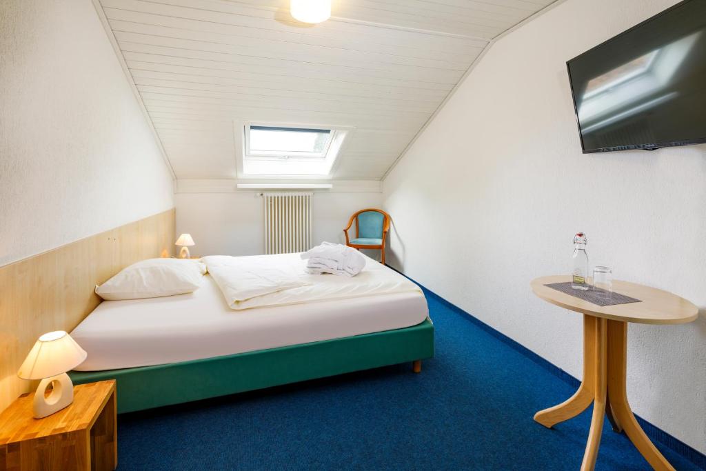 Postel nebo postele na pokoji v ubytování Central Hotel Post