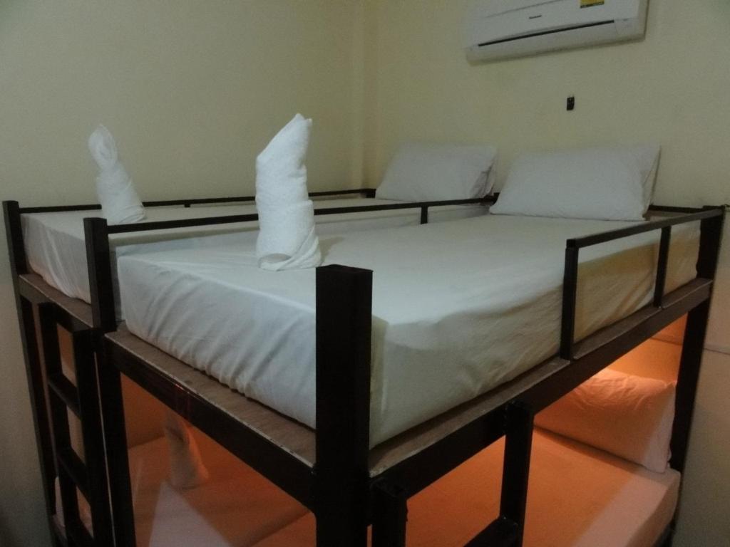 Postel nebo postele na pokoji v ubytování Seventeen Hostel