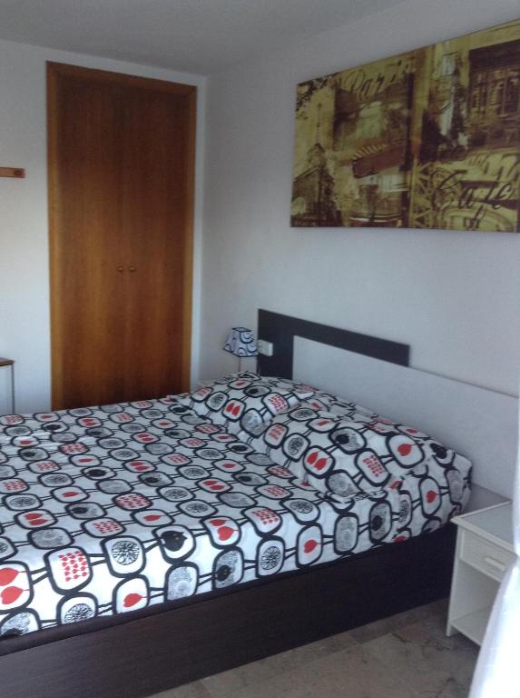 Posteľ alebo postele v izbe v ubytovaní Apartamento Edificio Diamant