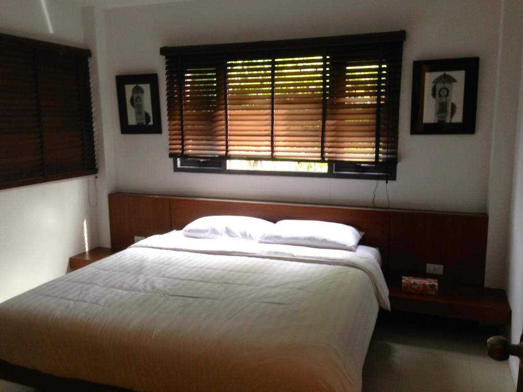Postel nebo postele na pokoji v ubytování TSE Residence [by Samui Emerald]