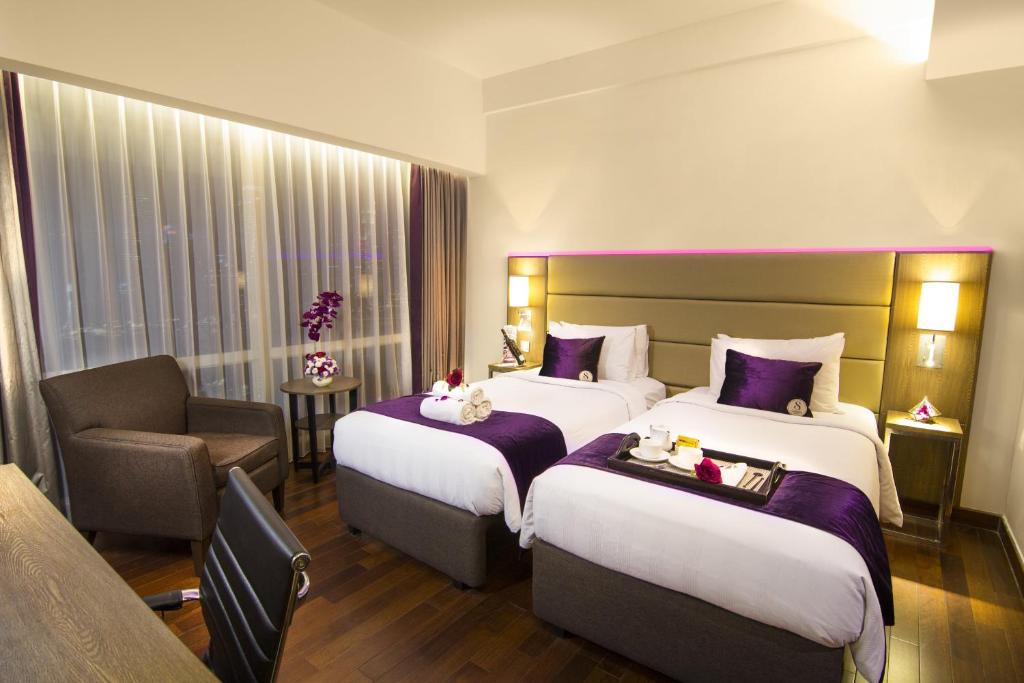 Postel nebo postele na pokoji v ubytování Satoria Hotel Yogyakarta - CHSE Certified