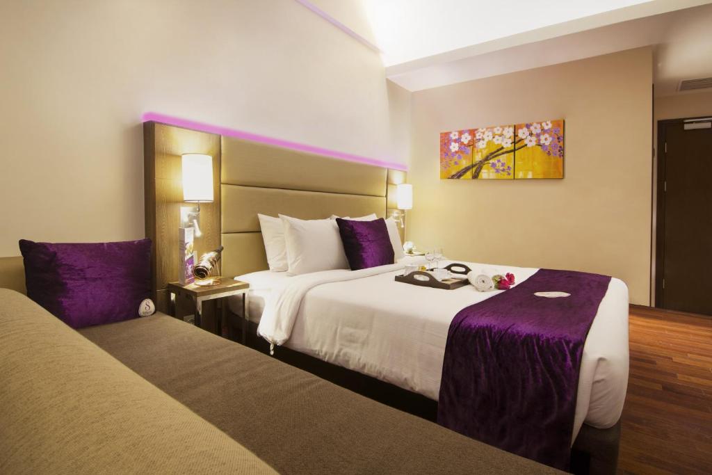 Postel nebo postele na pokoji v ubytování Satoria Hotel Yogyakarta - CHSE Certified