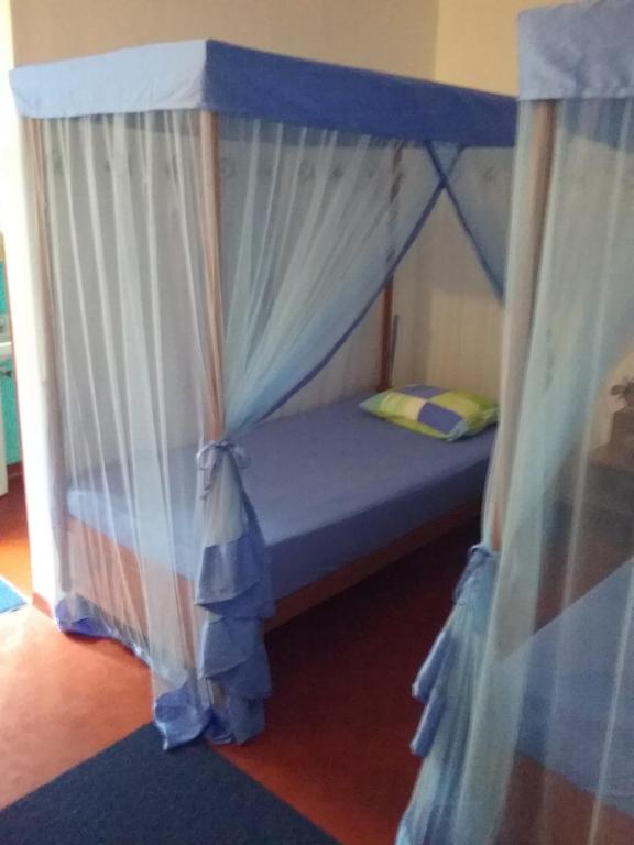 Postel nebo postele na pokoji v ubytování Gasthaus Langeoog