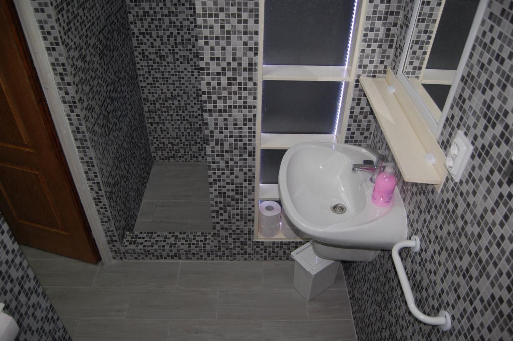 Koupelna v ubytování Tabán Apartman