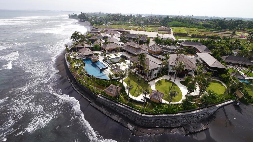 an aerial view of a resort by the ocean at Anapuri Villas in Ketewel