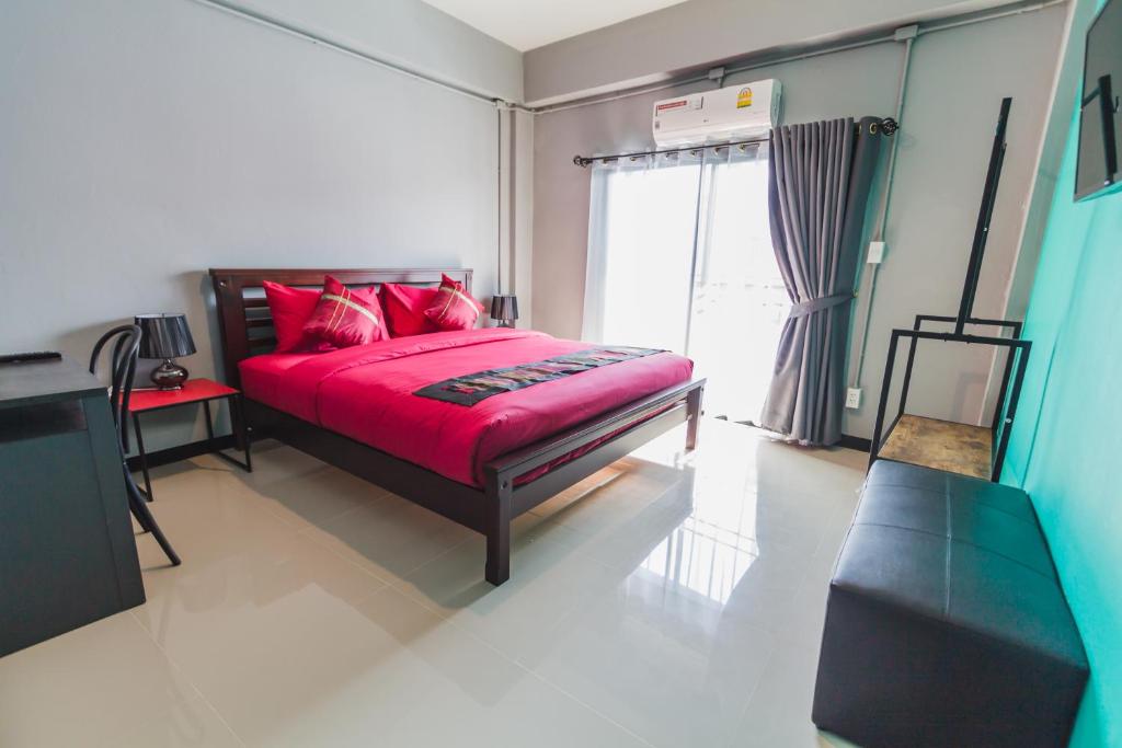 Giường trong phòng chung tại Chez Pom
