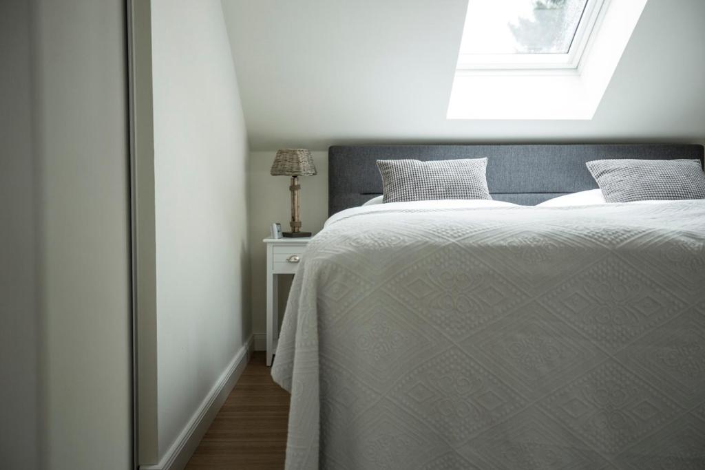 Postel nebo postele na pokoji v ubytování LOFT-ATELIER