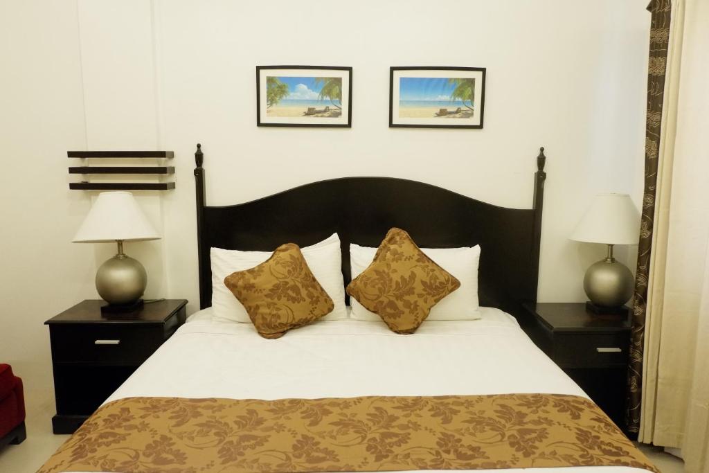 Postel nebo postele na pokoji v ubytování Chateau De Boracay