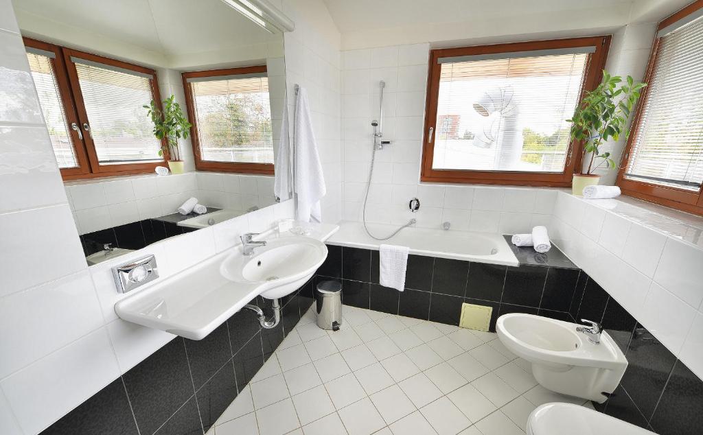Koupelna v ubytování EA Hotel Populus