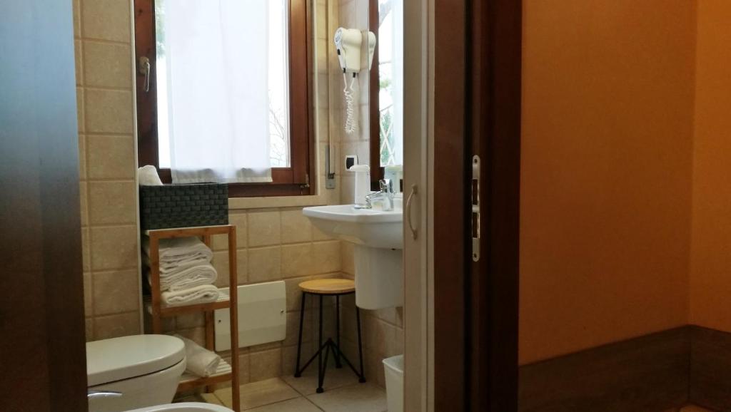 Koupelna v ubytování Hotel Renata