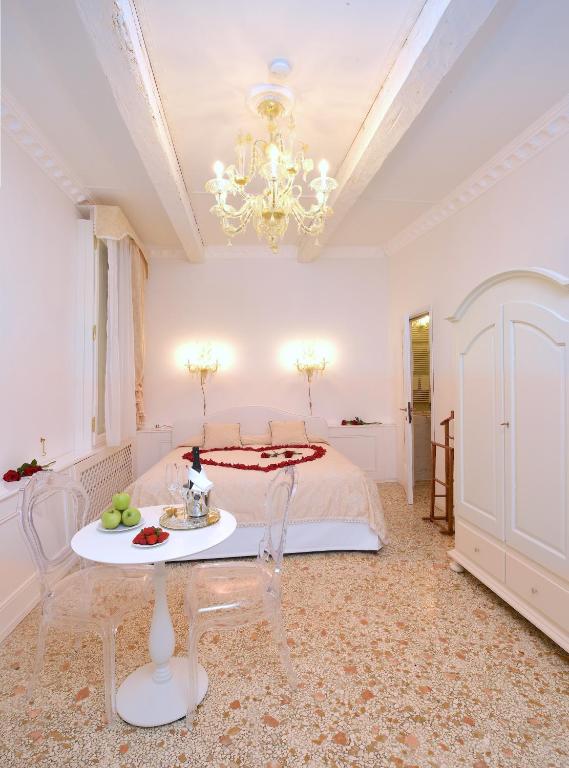 Cama o camas de una habitación en Antico Mercato