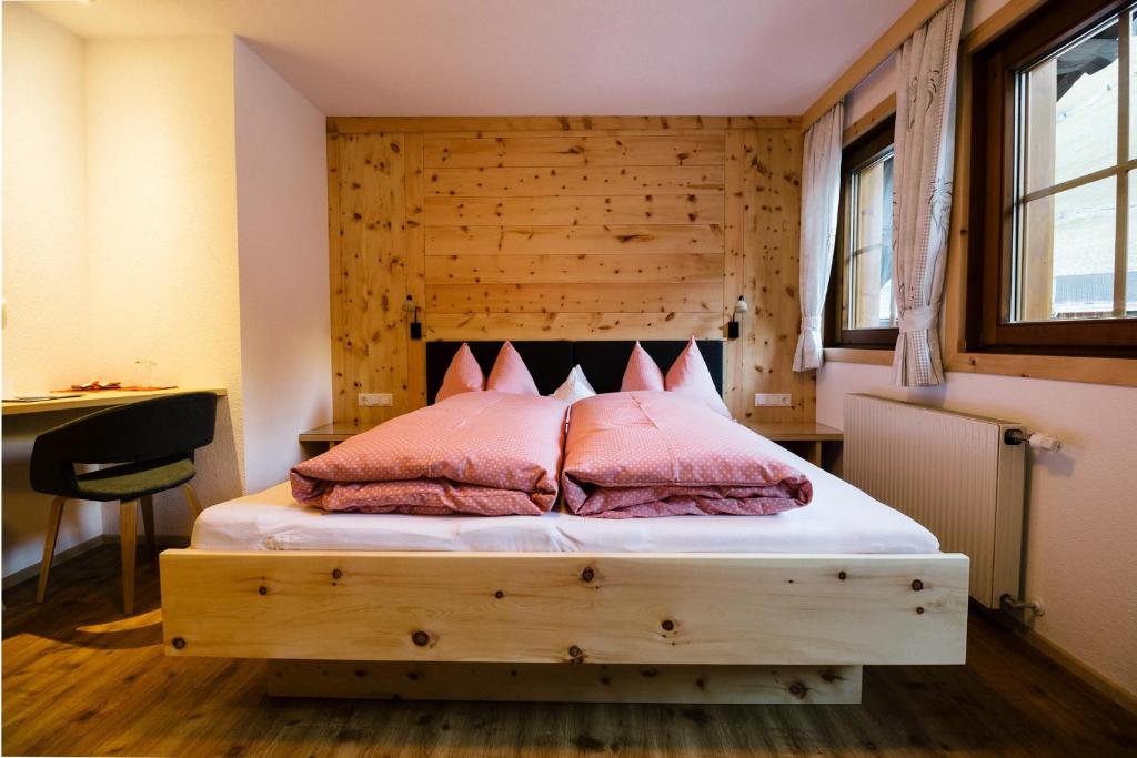 Postel nebo postele na pokoji v ubytování Gaestehaus Berger