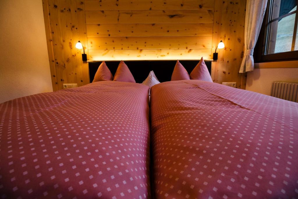 Postel nebo postele na pokoji v ubytování Gaestehaus Berger