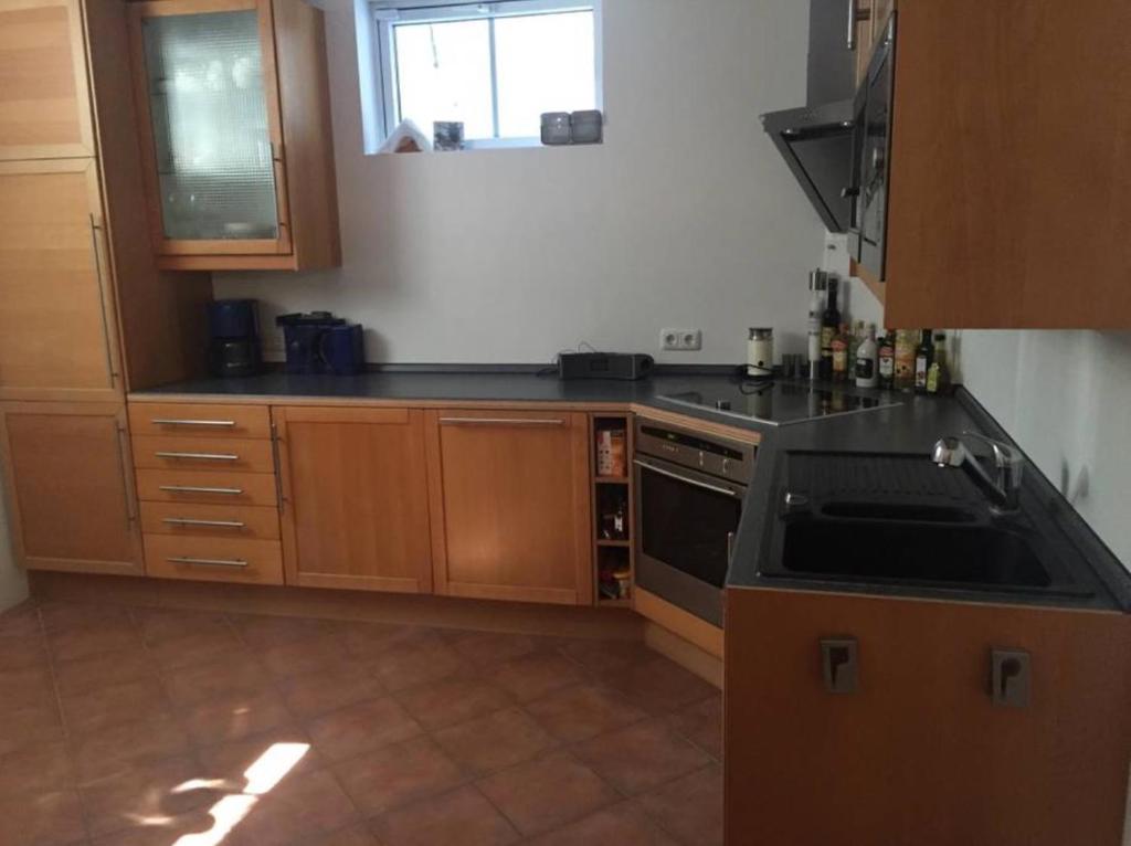 Kuchyň nebo kuchyňský kout v ubytování Einliegerwohnung Kleinmachnow