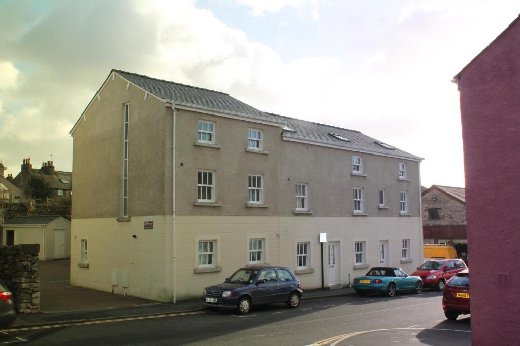 a large building on the side of a street at 2 Laurel Court in Ulverston