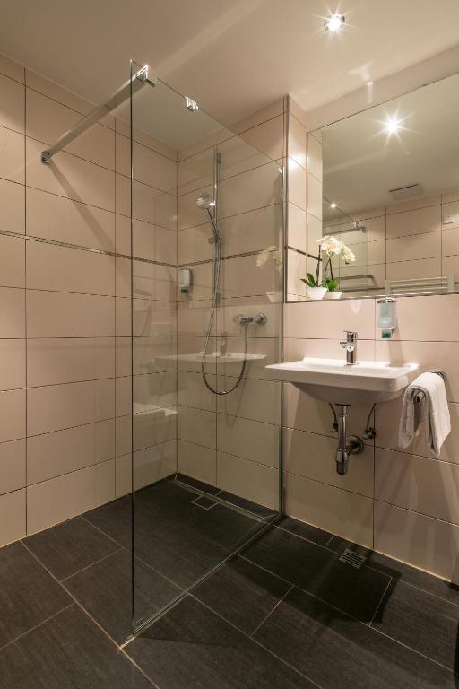 Koupelna v ubytování Hotel am Krone Park