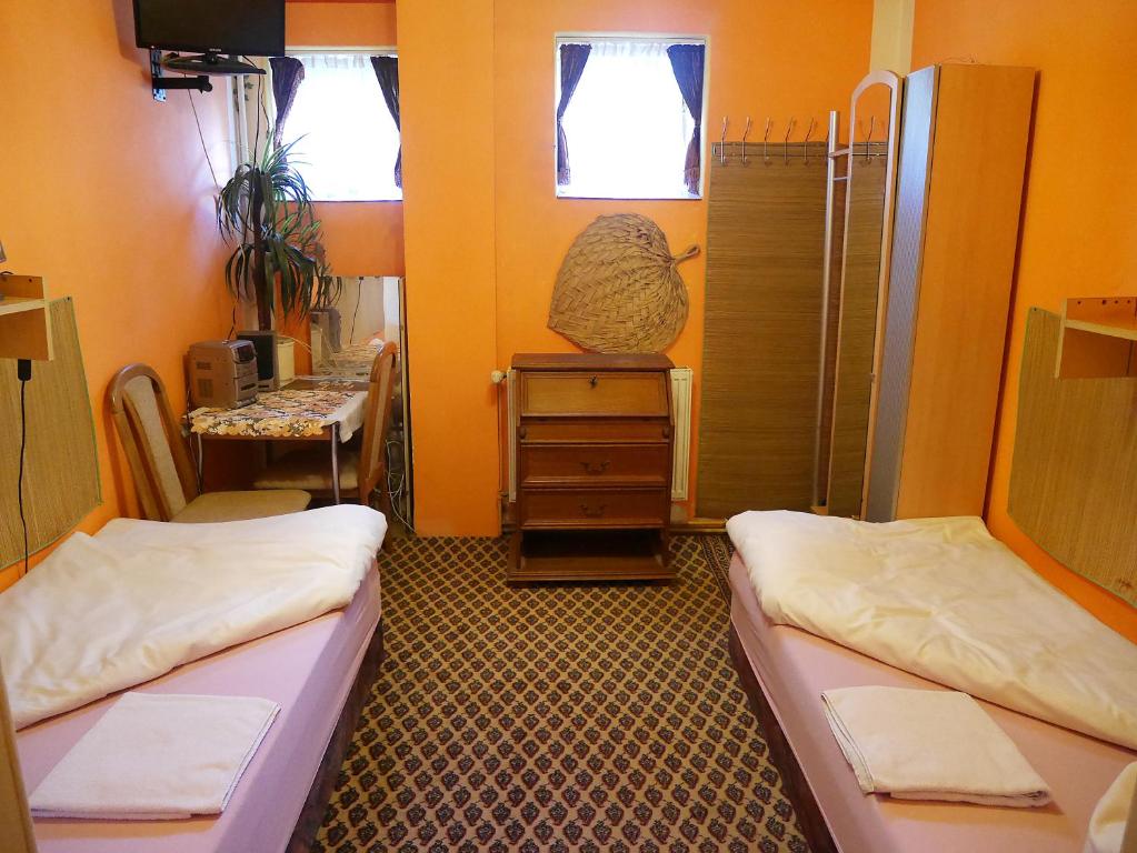 Postel nebo postele na pokoji v ubytování Pension Lada