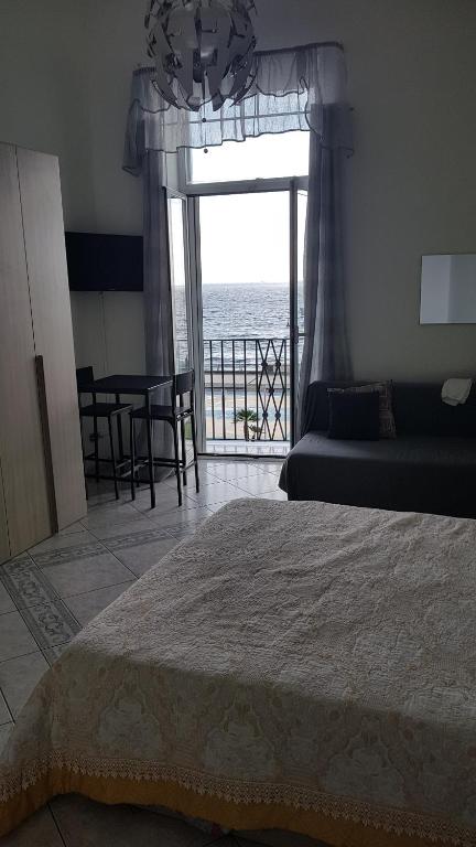 Postel nebo postele na pokoji v ubytování B&B del Mare