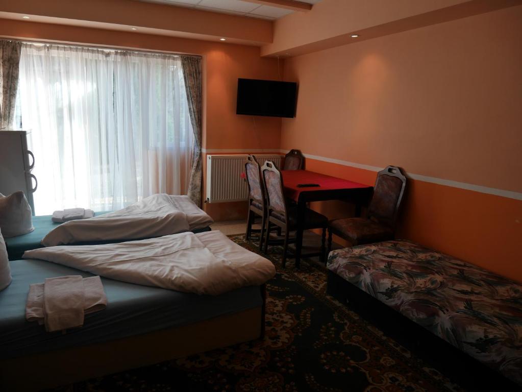 Postel nebo postele na pokoji v ubytování Pension Lada