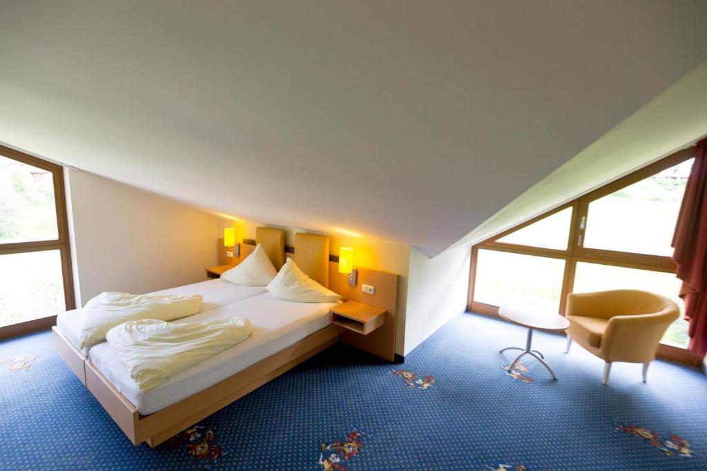 Postel nebo postele na pokoji v ubytování Family & Sporthotel Kärntnerhof