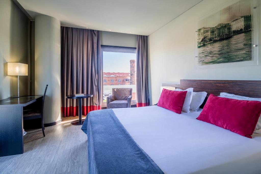 Postel nebo postele na pokoji v ubytování Melia Ria Hotel & Spa