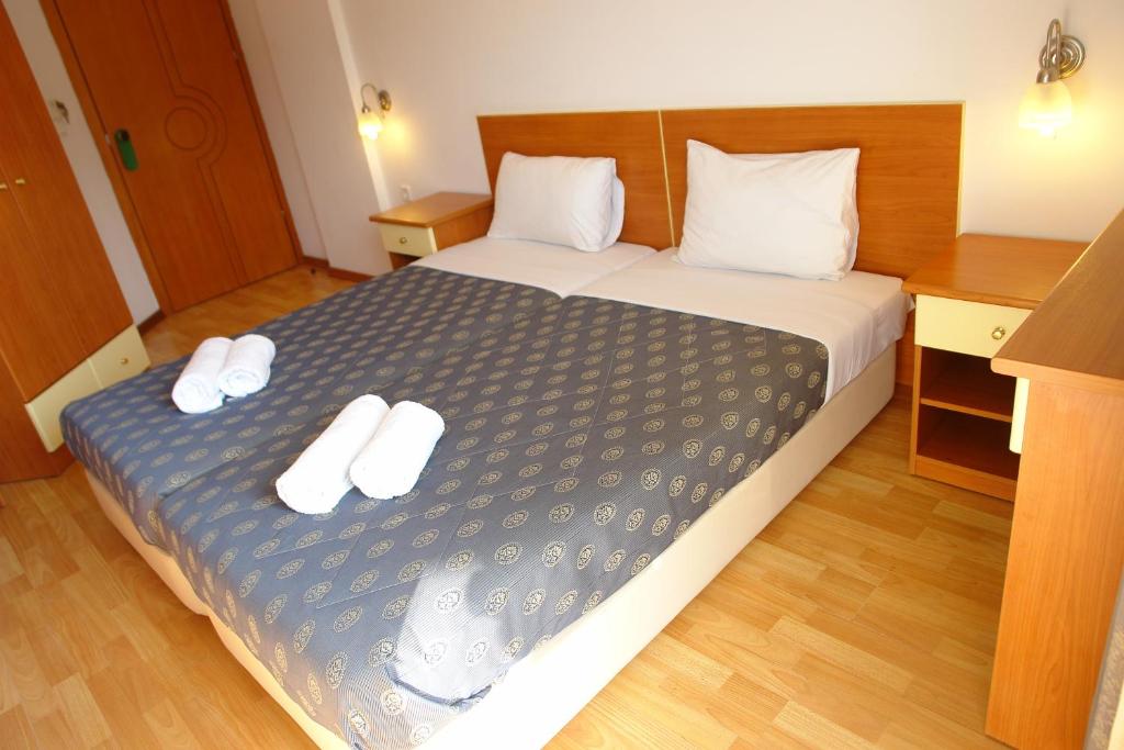 Postel nebo postele na pokoji v ubytování Hotel Filoxenia Beach