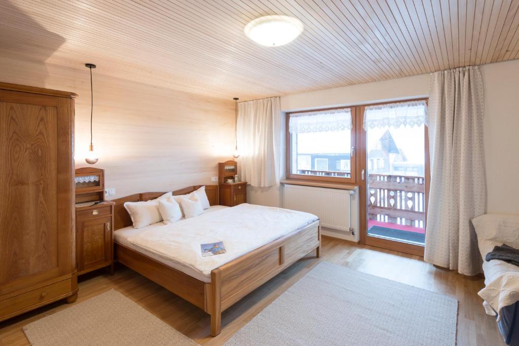 Postel nebo postele na pokoji v ubytování Appartements Christine