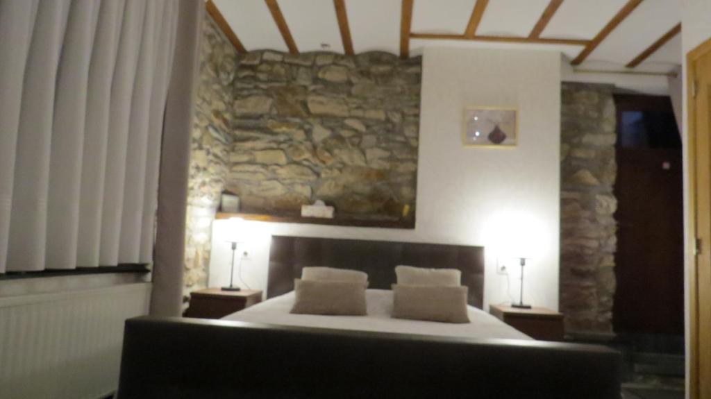 Postel nebo postele na pokoji v ubytování B&B Nord Sud