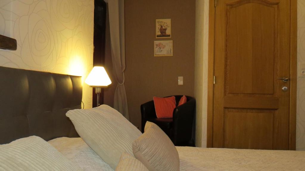 Postel nebo postele na pokoji v ubytování B&B Nord Sud