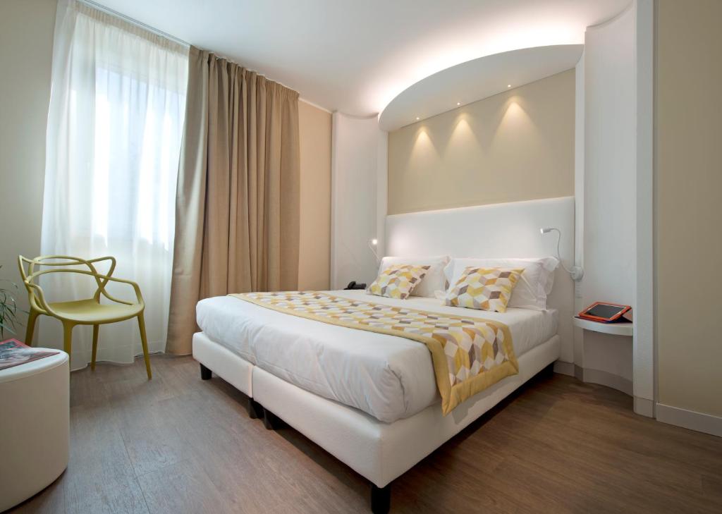 Postel nebo postele na pokoji v ubytování Ark Hotel