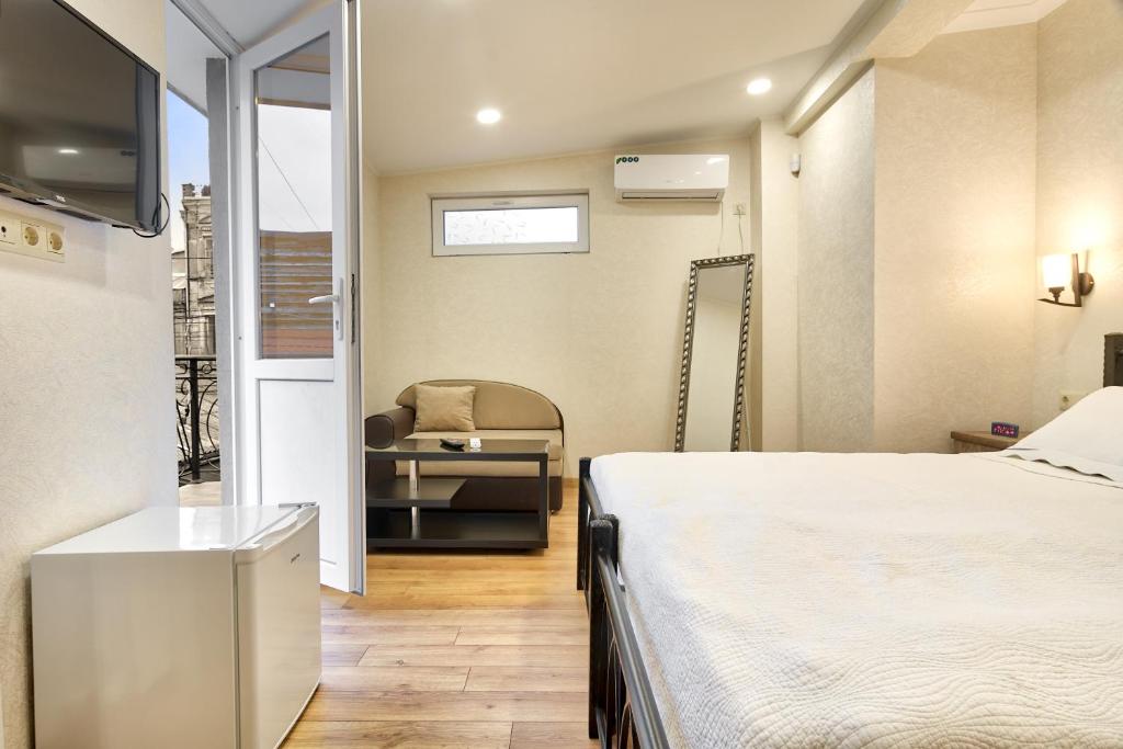 Postel nebo postele na pokoji v ubytování Q&B House