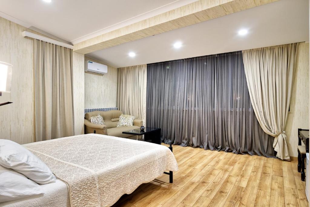 Postel nebo postele na pokoji v ubytování Q&B House