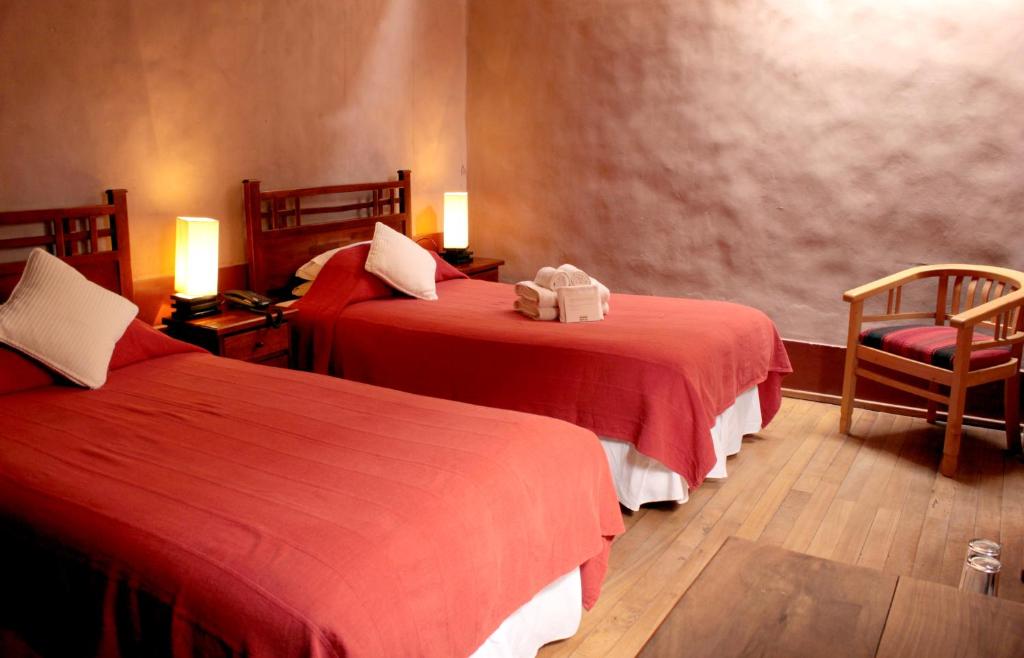 Postel nebo postele na pokoji v ubytování Hotel Kimal