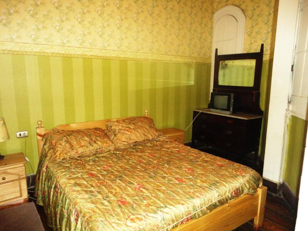 Postel nebo postele na pokoji v ubytování Hotel Garden