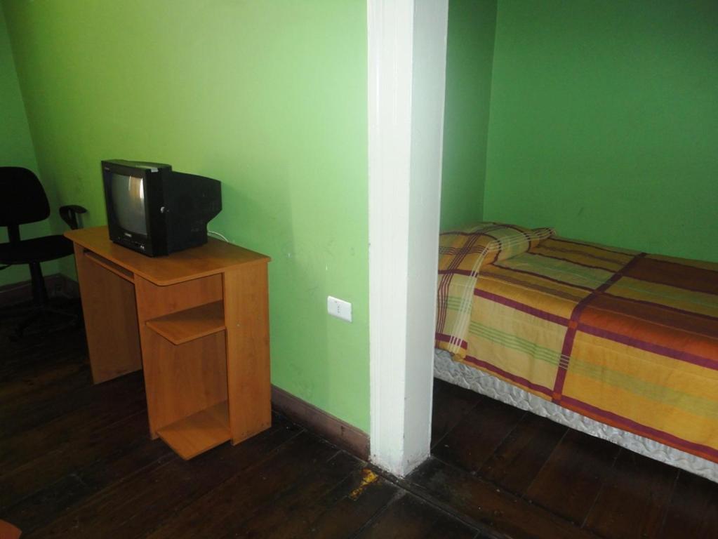 TV a/nebo společenská místnost v ubytování Hotel Garden