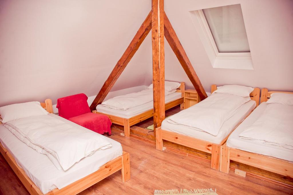Postel nebo postele na pokoji v ubytování Pension Cabana Cetatile Ponorului