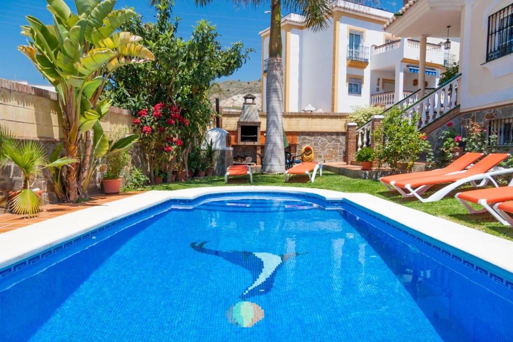 Bazén v ubytování Villa Karina Nerja nebo v jeho okolí