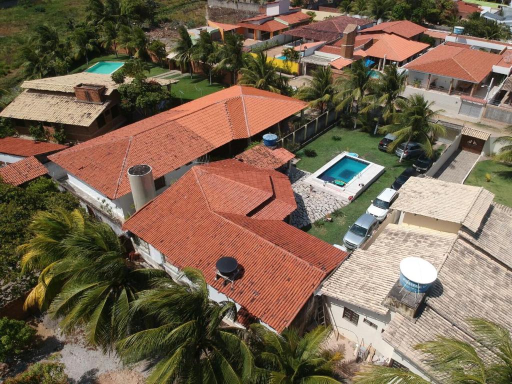 an overhead view of a house with an orange roof at Casa Barra de São Miguel in Barra de São Miguel