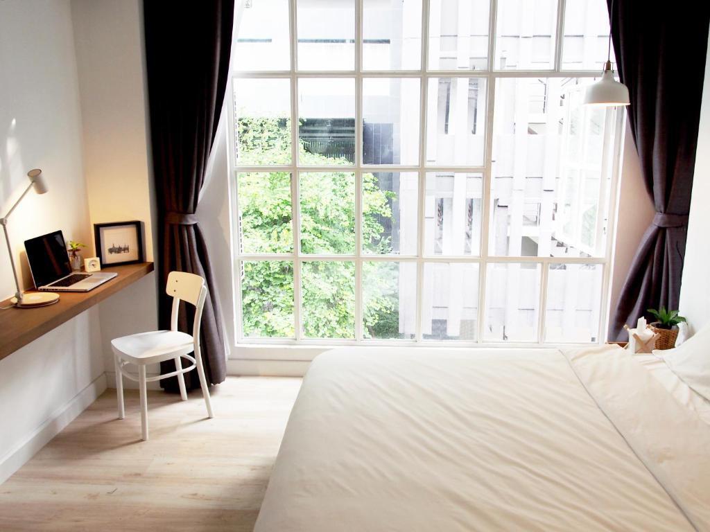 Giường trong phòng chung tại Varmtel