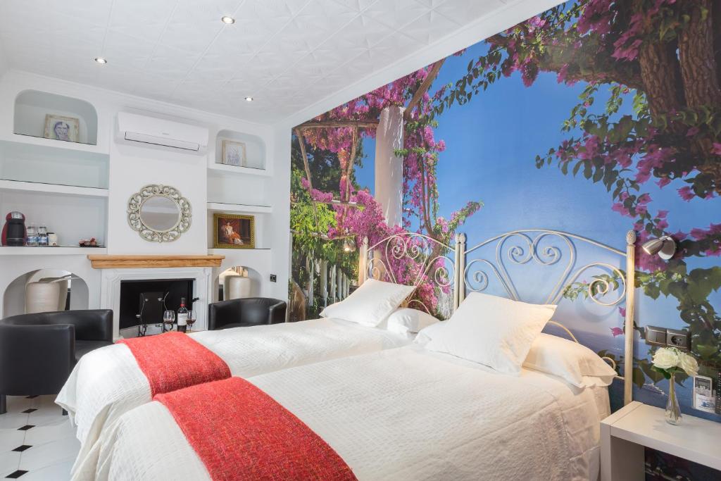 Cama o camas de una habitación en Salamandra Plaza