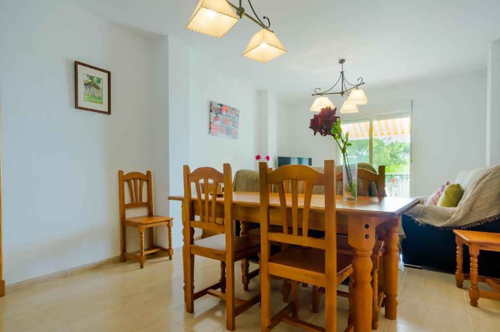Posedenie v ubytovaní Apartamentos Rotonda