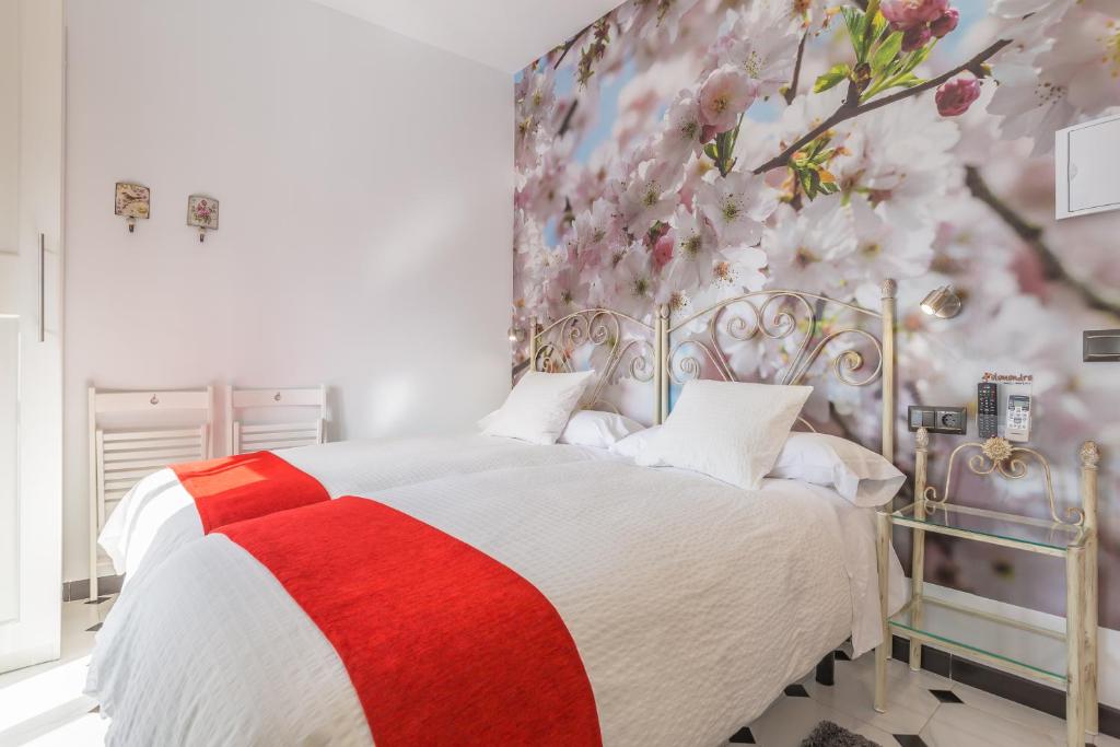 Cama o camas de una habitación en Salamandra Plaza