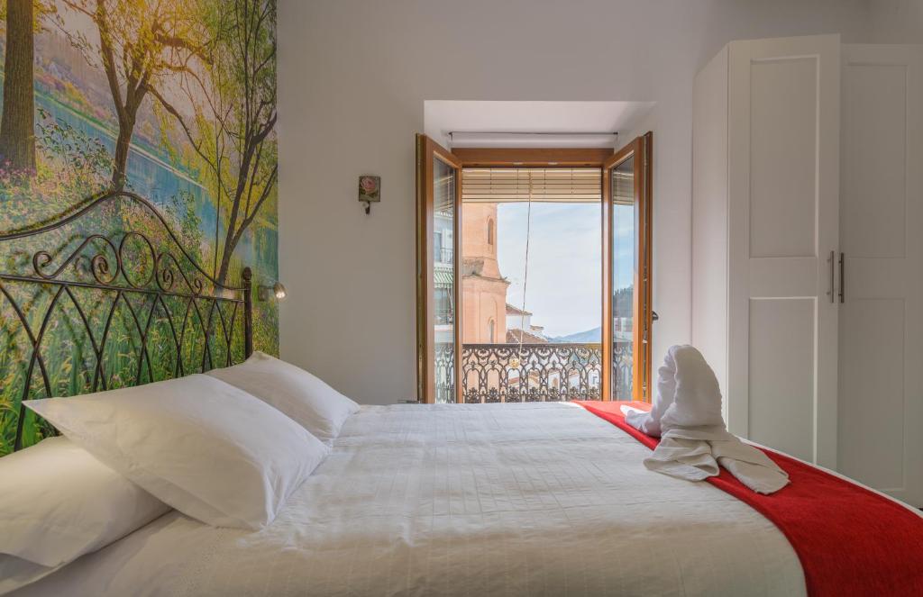 Cama o camas de una habitación en Salamandra Plaza