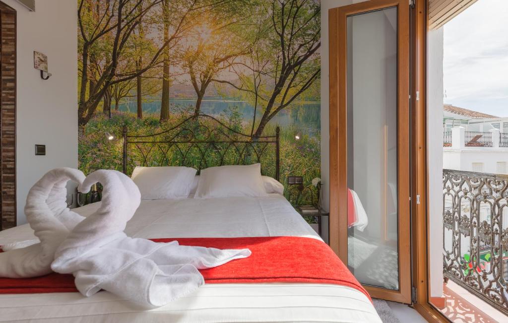 Cama o camas de una habitación en Salamandra Plaza